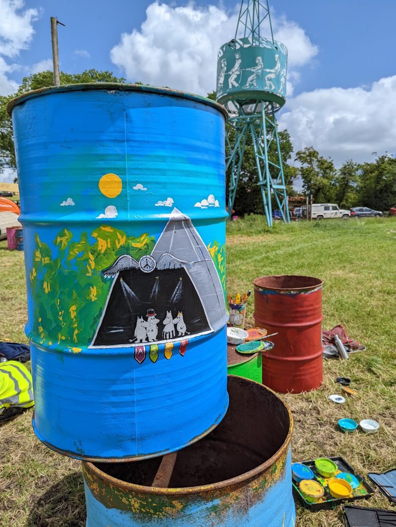 glastonbury charity bins 2022 Moomins with Pyramid Stage